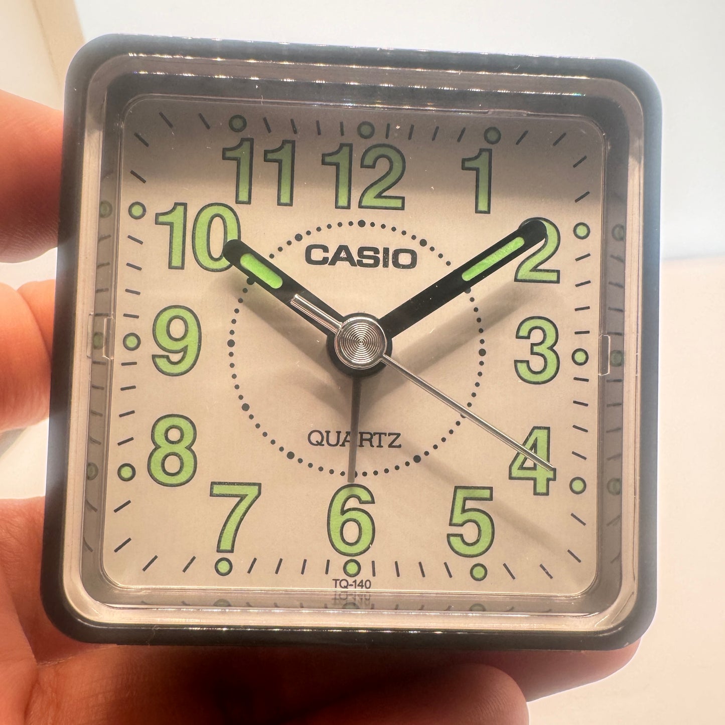 Small Alarm Clock By Casio Brand , Size 2”x 2” . Run by Battery AA . New Item