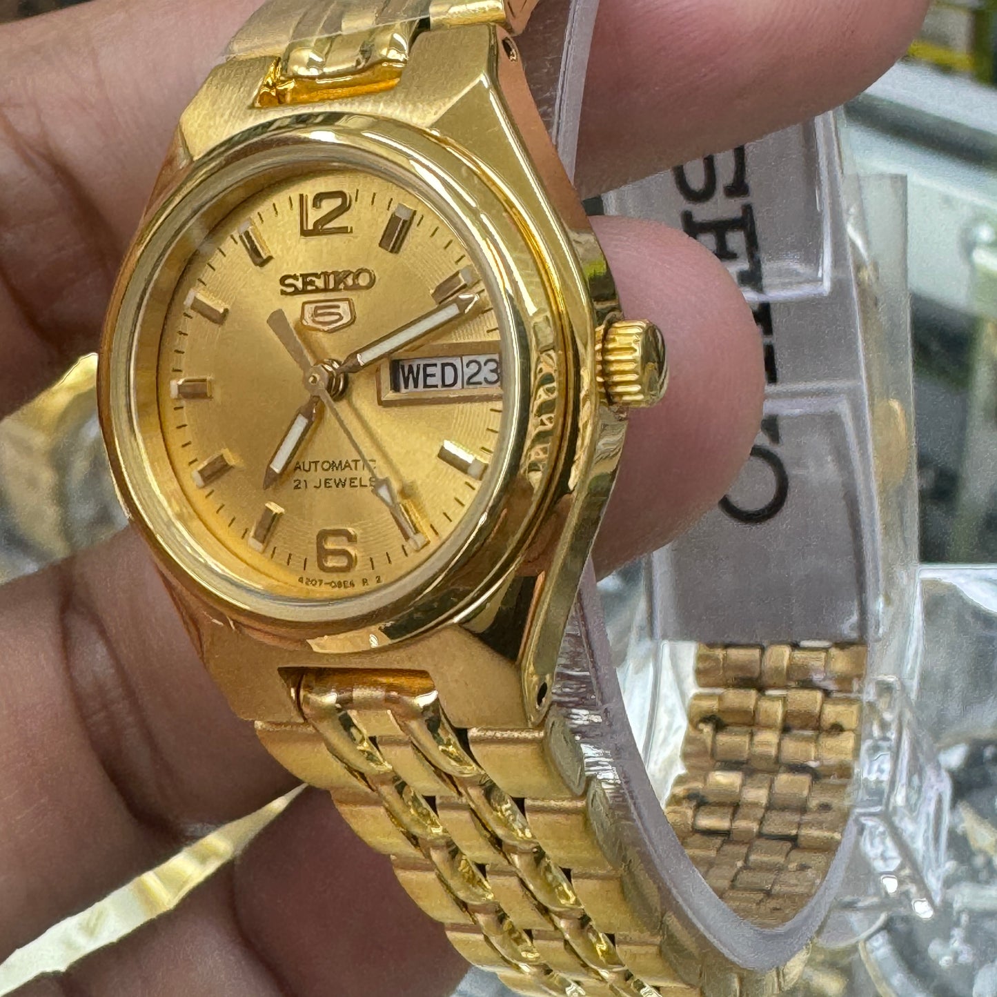 Seiko Adult Ladies or Young Teen Size 25mm Diameter, 7 inches Long, No Battery Needed , Automatic movement , Brand New Item . Stainless Steel Goldtone Color .