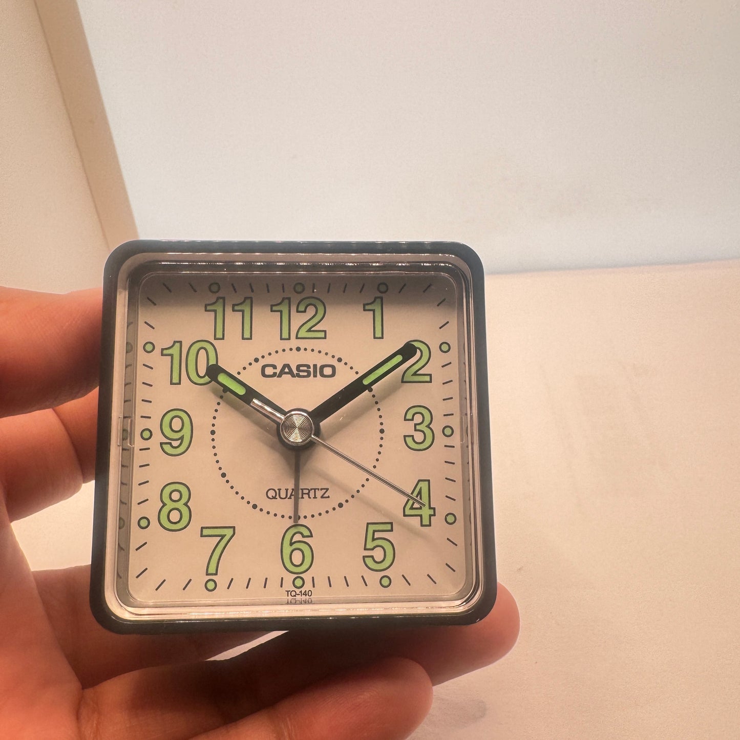Small Alarm Clock By Casio Brand , Size 2”x 2” . Run by Battery AA . New Item
