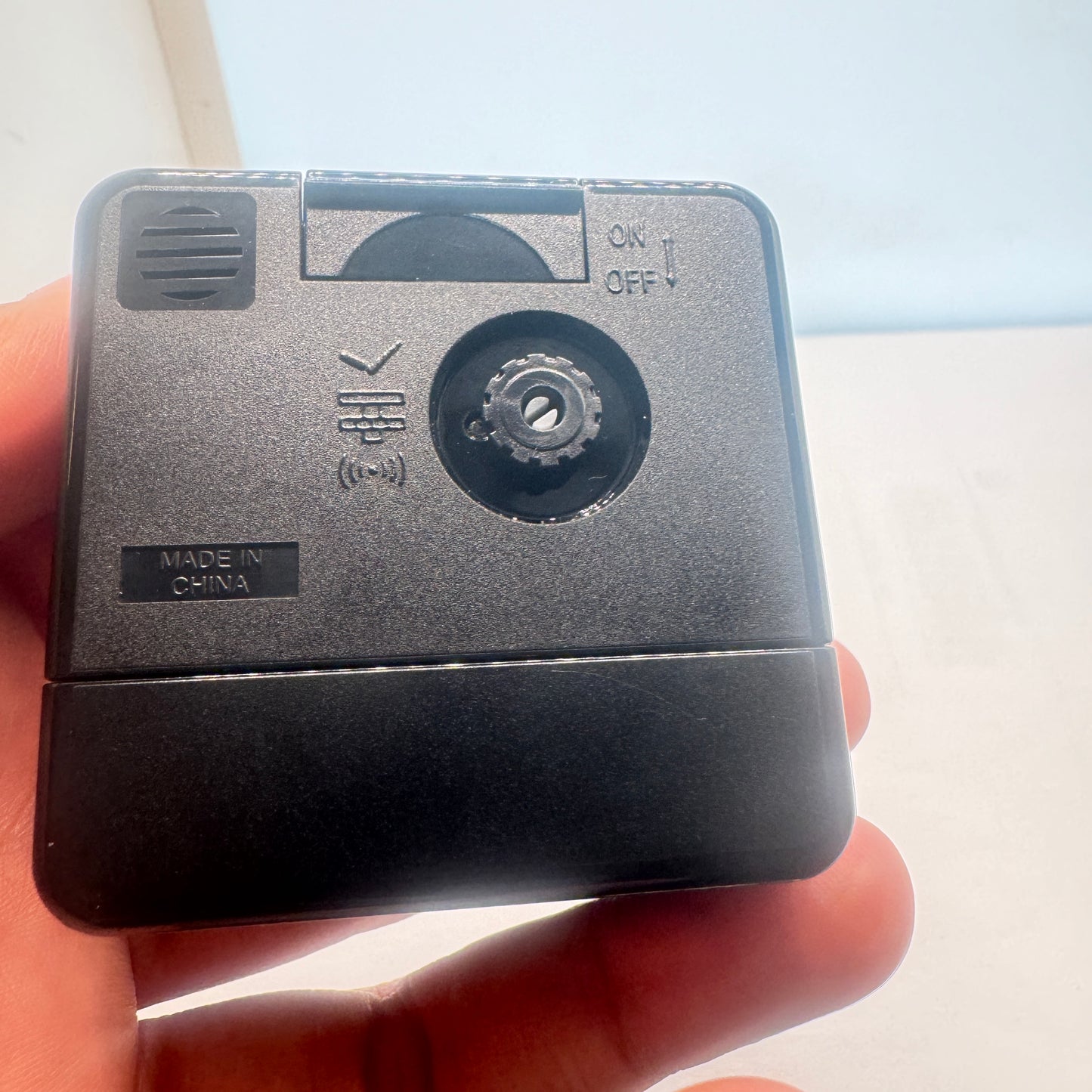 Small Alarm Clock By Casio Brand , Size 2”x 2” . Run by Battery AA . New Item