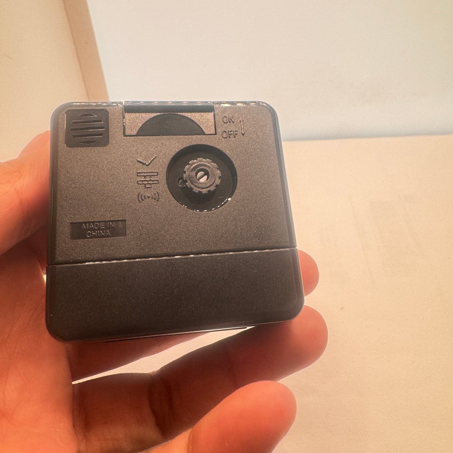 Small Alarm Clock By Casio Brand , Size 2”x 2” . Run by Battery AA . New Item