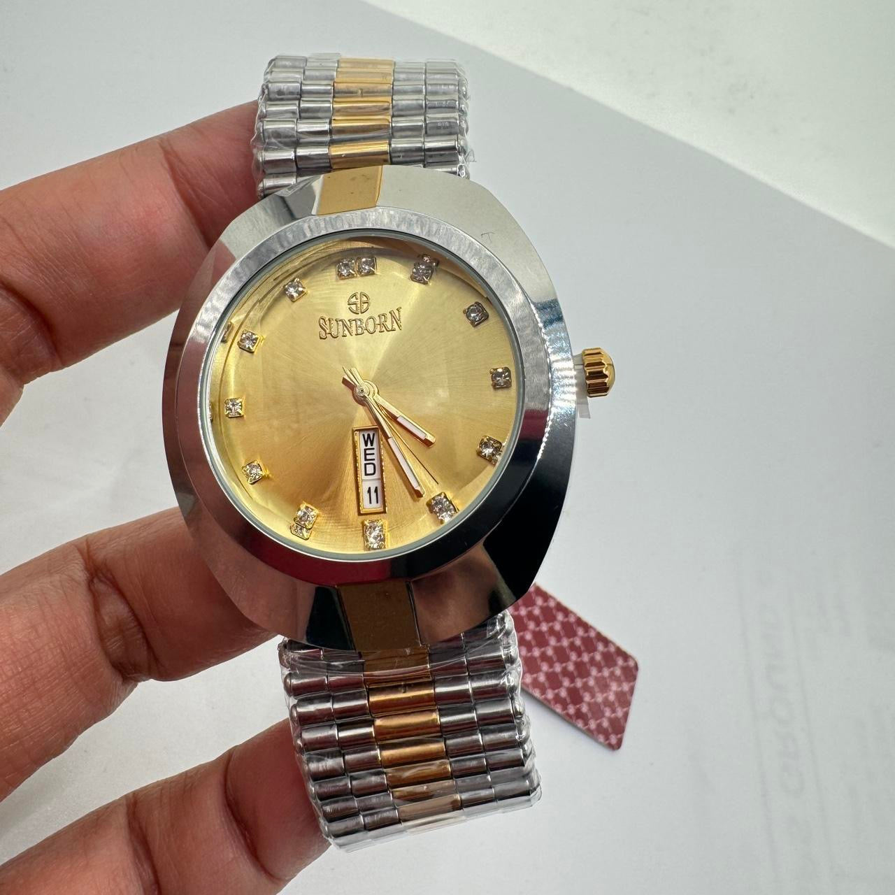 Sunborn Brand Watch for Men , 40mm Diameter , Brand New Item , Stainless Steel , Water Resistant , With Tag Still Attached . Color Mix Goldtone and Gray , with Date, Ships from NEW JERSEY