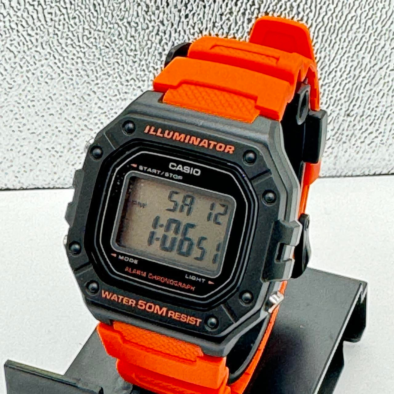 Casio Watch For Men or Young Teen Watch Fits up to 9 inches Long Digital Movement Light , Calendar , Timer Stop, Color light red New ITem Rubber Band 9 inches long 40 mm Diameter 