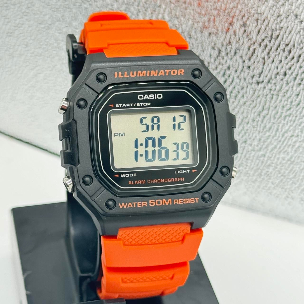 Casio Watch For Men or Young Teen Watch Fits up to 9 inches Long Digital Movement Light , Calendar , Timer Stop, Color light red New ITem Rubber Band 9 inches long 40 mm Diameter 