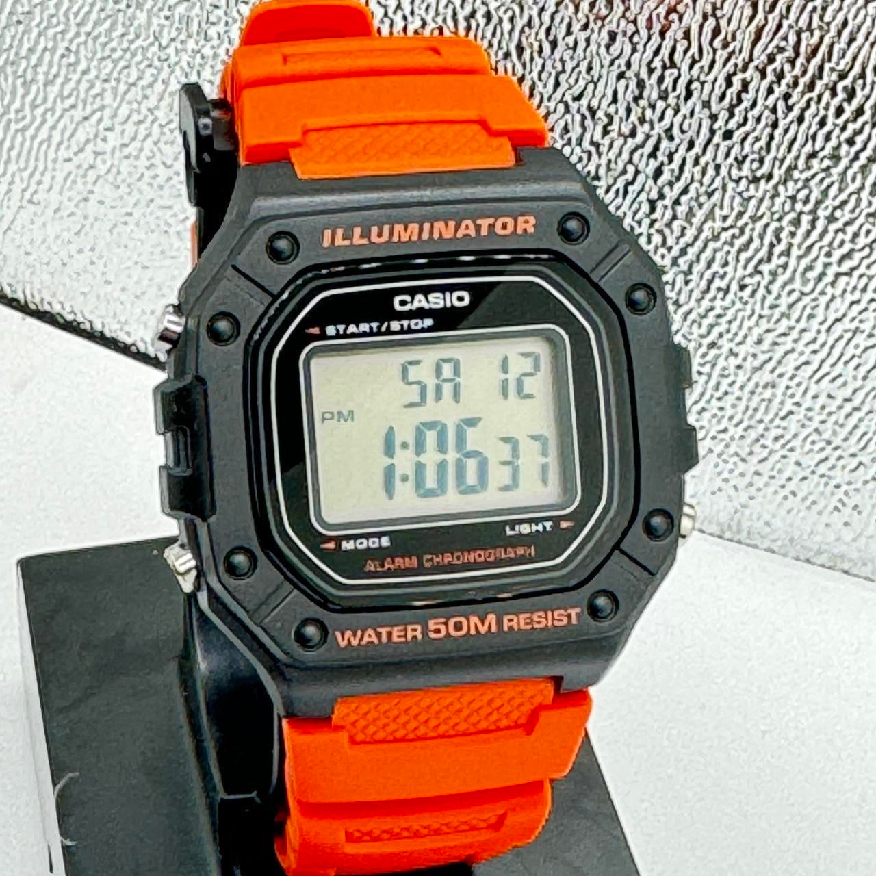 Casio Watch For Men or Young Teen Watch Fits up to 9 inches Long Digital Movement Light , Calendar , Timer Stop, Color light red New ITem Rubber Band 9 inches long 40 mm Diameter 