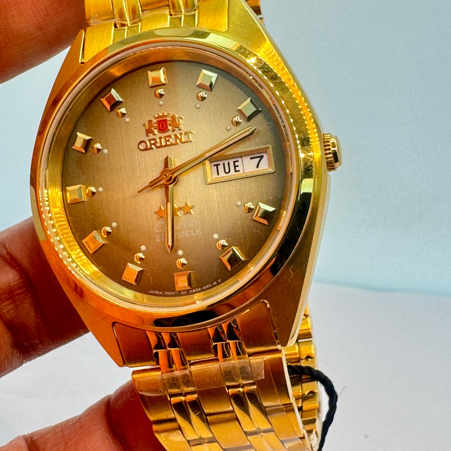 Goldtone Watch , Orient Brand , Automatic Movement , for Men , Brand New , Stainless Steel , 37 mm diameter 8 “ Wrist. round long