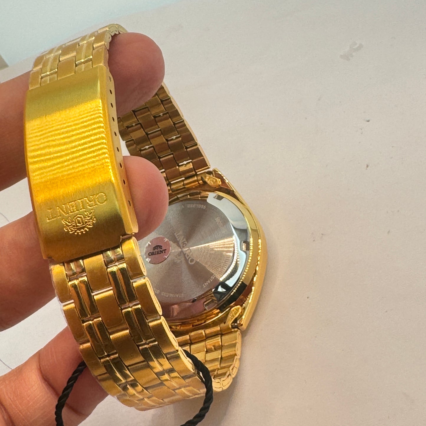 Goldtone Watch , Orient Brand , Automatic Movement , for Men , Brand New , Stainless Steel , 37 mm diameter 8 “ Wrist. round long