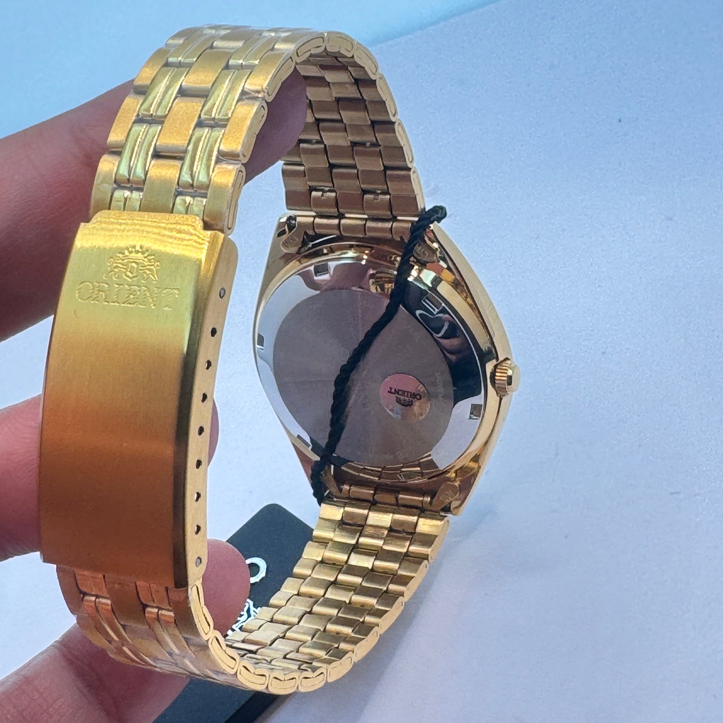Goldtone Watch , Orient Brand , Automatic Movement , for Men , Brand New , Stainless Steel , 37 mm diameter 8 “ Wrist. round long