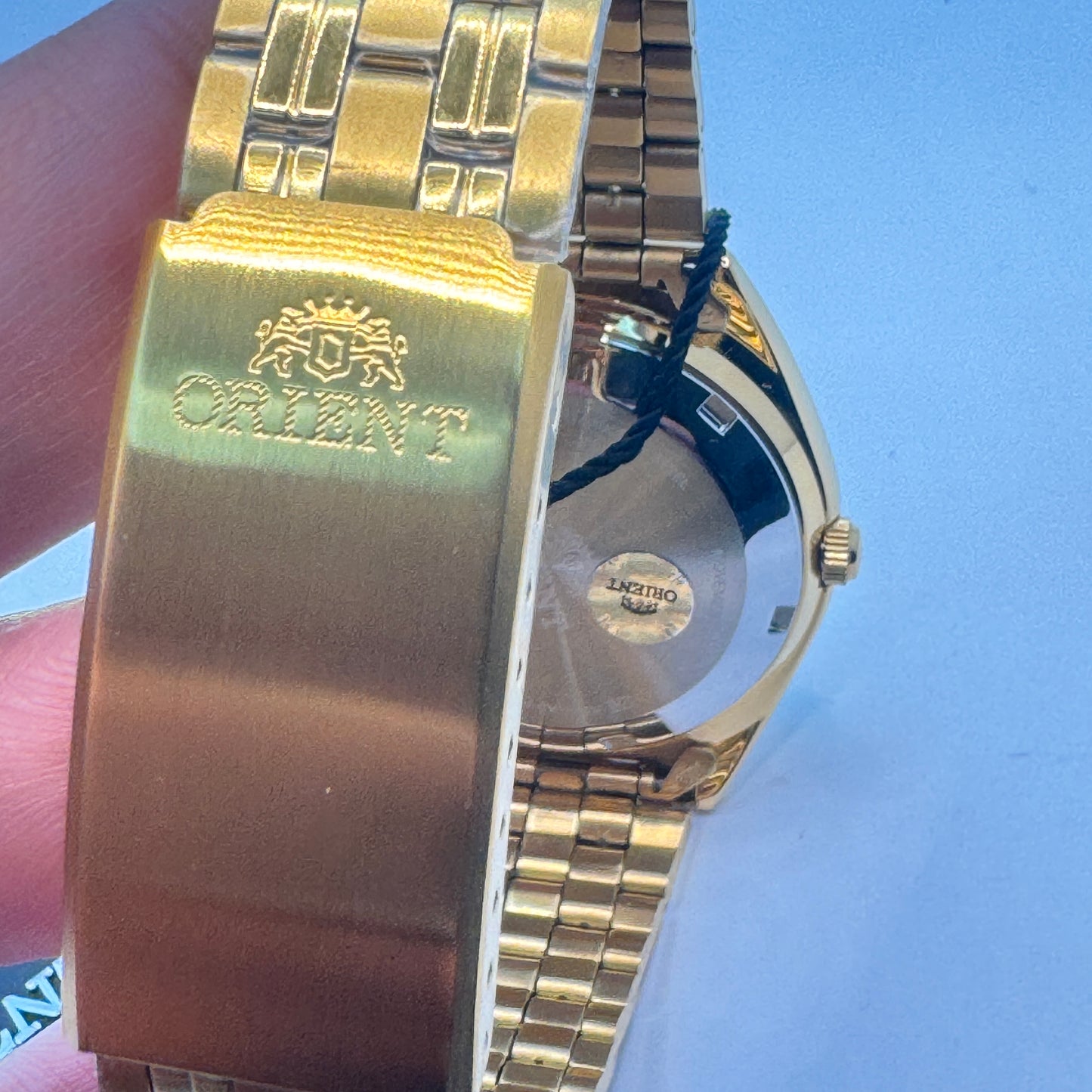 Goldtone Watch , Orient Brand , Automatic Movement , for Men , Brand New , Stainless Steel , 37 mm diameter 8 “ Wrist. round long