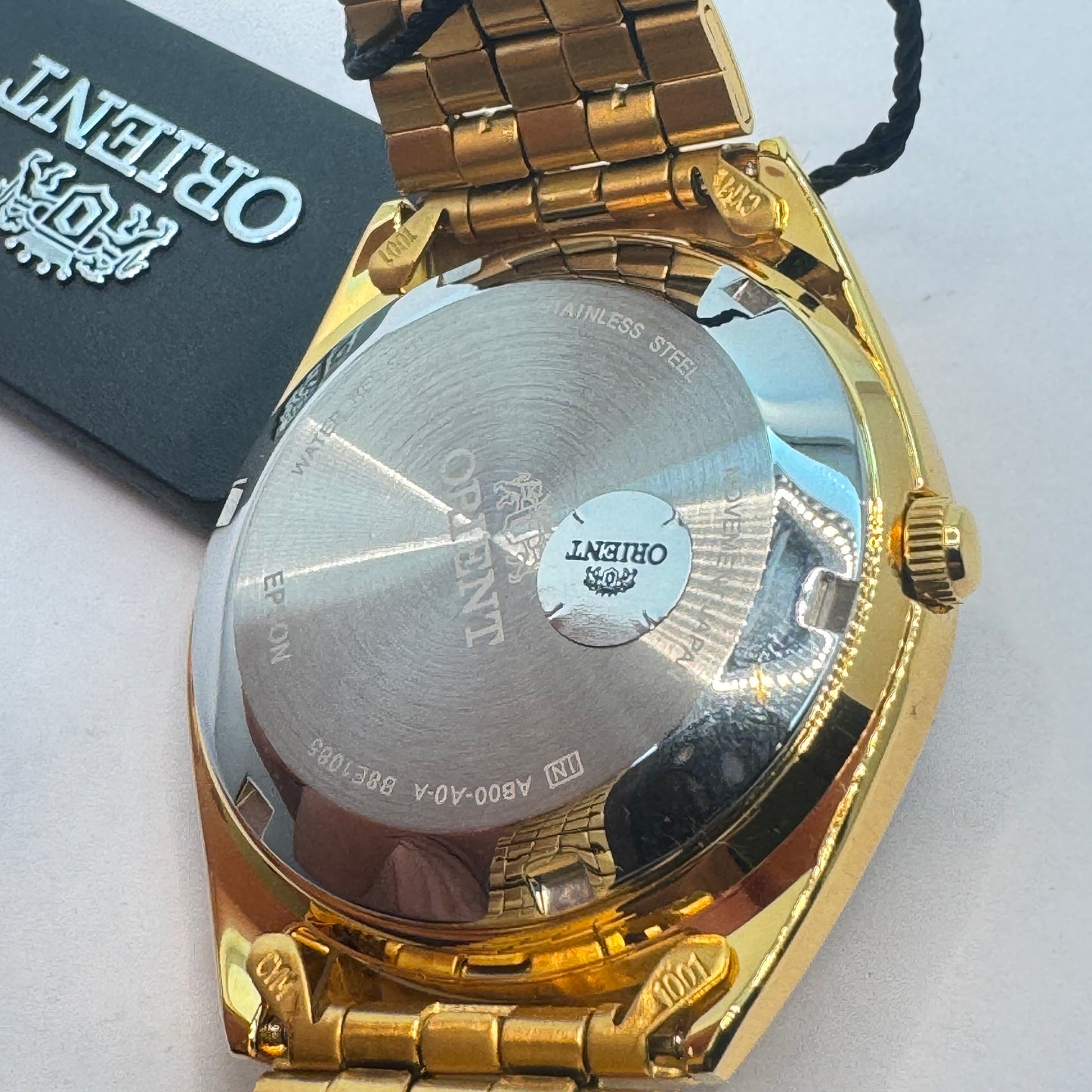 Goldtone Watch , Orient Brand , Automatic Movement , for Men , Brand New , Stainless Steel , 37 mm diameter 8 “ Wrist. round long