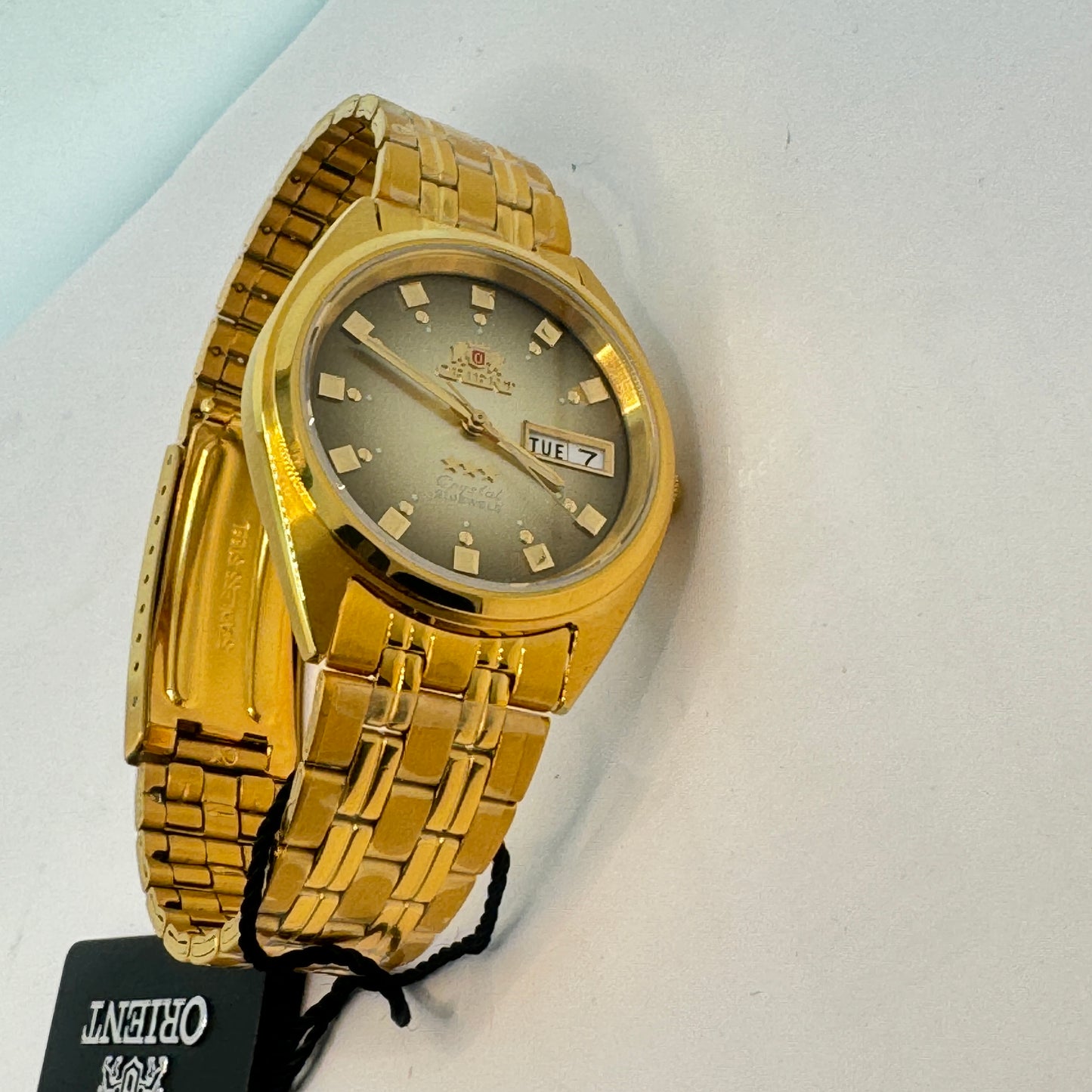 Goldtone Watch , Orient Brand , Automatic Movement , for Men , Brand New , Stainless Steel , 37 mm diameter 8 “ Wrist. round long