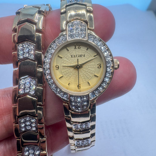 Elgin Watch Adult /Ladies or  for Young Teen ,Bracelet with Set Watch too  extra small size  Fancy  Band   Goldtone Color  New Battery Installed Inside  Band Length is aroud 7 inches Long  20 mm Diameter Extra Small