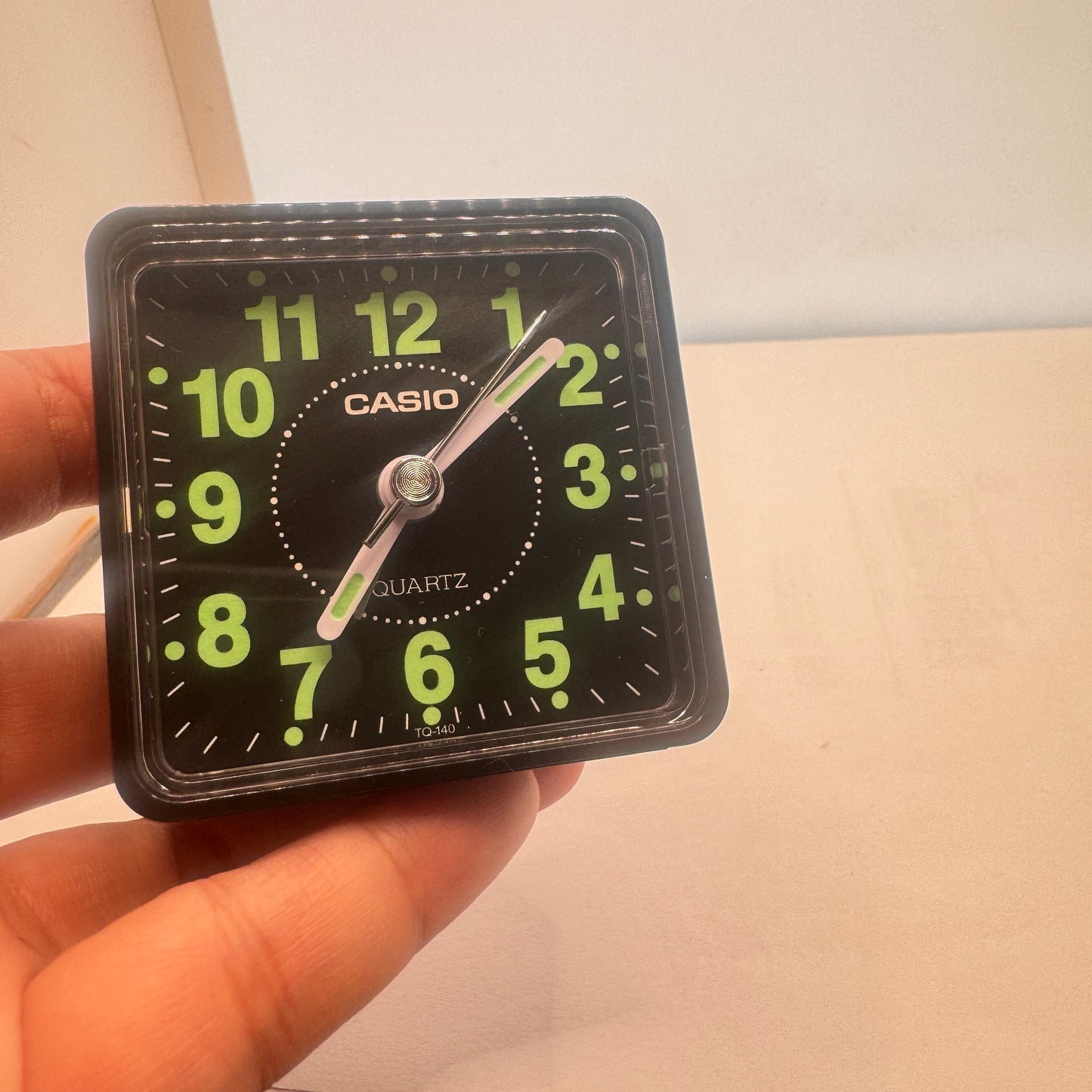 Small Alarm Clock By Casio Brand , Size 2”x 2” . Run by Battery AA . New Item